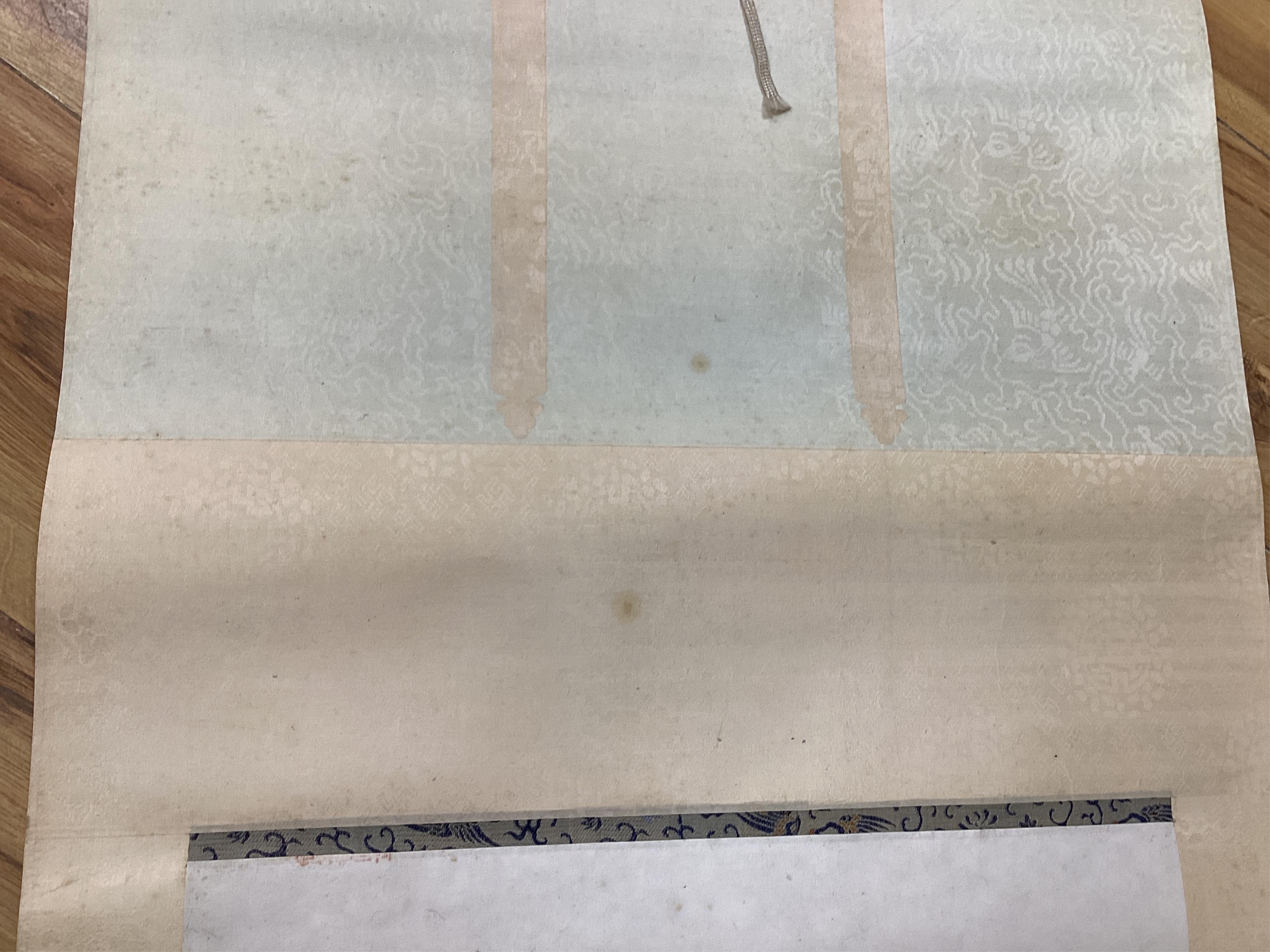 A set of four Chinese scroll paintings of ladies before landscapes, 48cm wide. Condition - fair